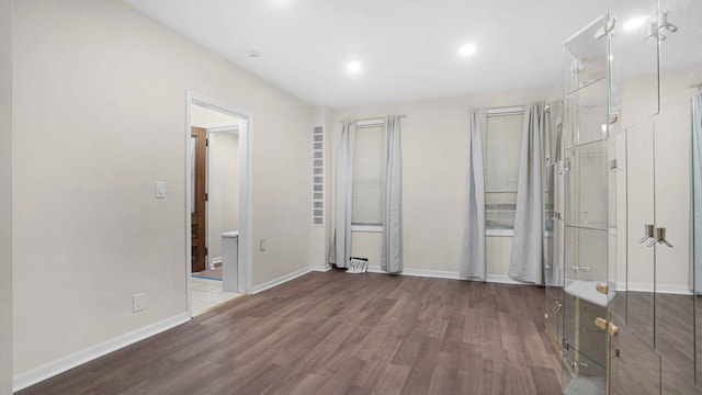 868 Morris Park Ave, Bronx, NY 10462 - unfurnished bedroom with wood finished floors and recessed lighting