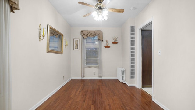 868 Morris Park Ave, Bronx, NY 10462 - hall with radiator heating unit and wood finished floors