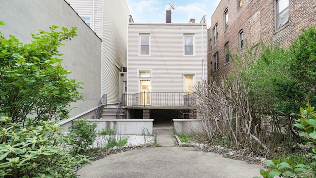 868 Morris Park Ave, Bronx, NY 10462 - back of property with a chimney and stairway