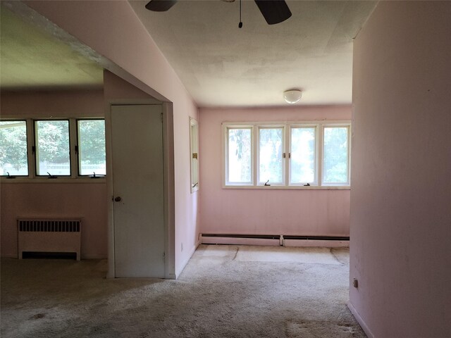 2 High Pne, Glen Cove, NY 11542 - corridor with radiator heating unit, carpet floors, and baseboard heating