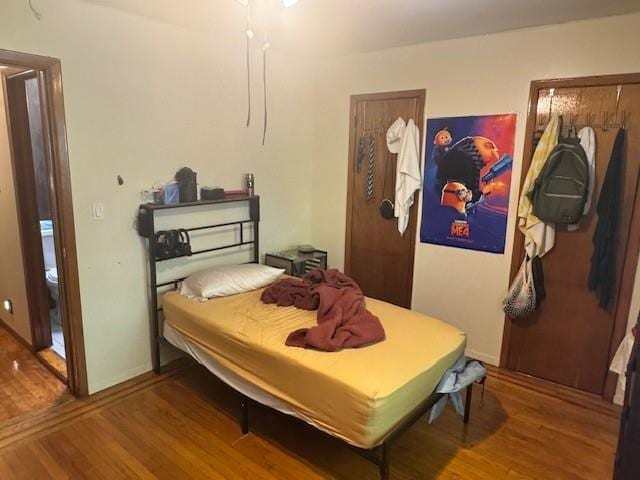 33-42 70th St, Jackson Heights, NY 11372 - bedroom featuring wood finished floors