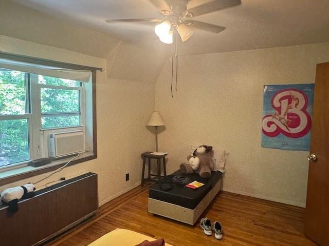 33-42 70th St, Jackson Heights, NY 11372 - home office featuring wood finished floors, a ceiling fan, and cooling unit