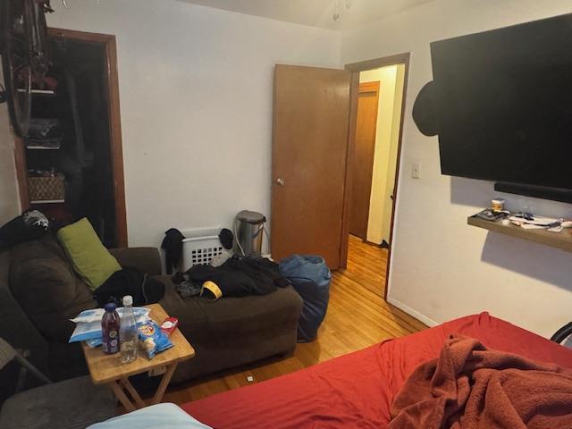 33-42 70th St, Jackson Heights, NY 11372 - bedroom featuring light wood-type flooring