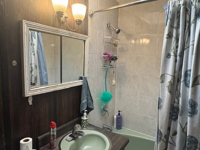 33-42 70th St, Jackson Heights, NY 11372 - full bath featuring shower / bath combination with curtain and a sink