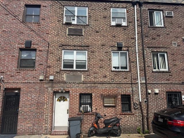 33-42 70th St, Jackson Heights, NY 11372 - view of building exterior featuring cooling unit
