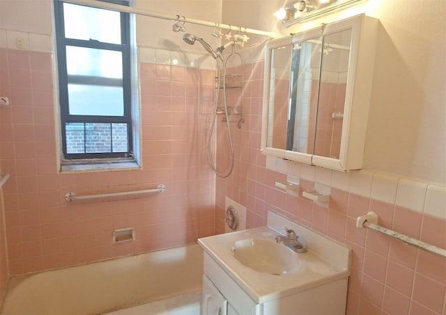 2866 Marion Ave Unit 4C, Bronx, NY 10458 - full bath featuring vanity, shower / bath combination, and tile walls