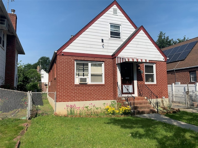 82-16 251st St, Bellerose, NY 11426 - view of front of home featuring brick siding and a gate