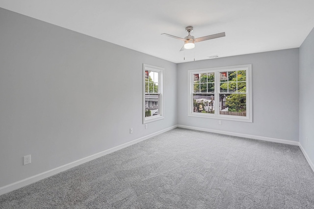 159 Mohawk St, Ronkonkoma, NY 11779 - carpeted spare room with baseboards and ceiling fan