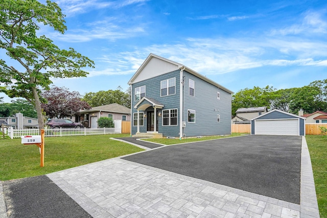 159 Mohawk St, Ronkonkoma, NY 11779 - view of front of house with an outbuilding and a detached garage