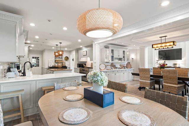 62 Hamlet Dr, Commack, NY 11725 - dining area featuring recessed lighting, a chandelier, and ornamental molding