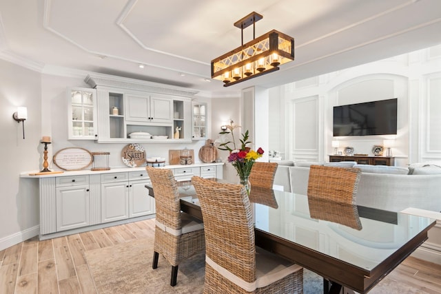62 Hamlet Dr, Commack, NY 11725 - dining room with light wood-type flooring, crown molding, and recessed lighting