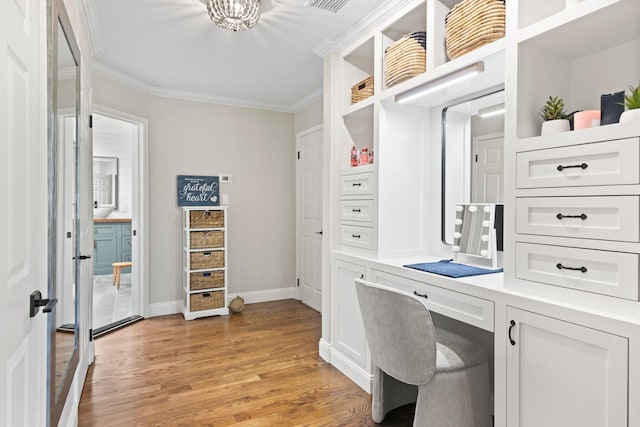 62 Hamlet Dr, Commack, NY 11725 - office area with crown molding and light wood-style floors