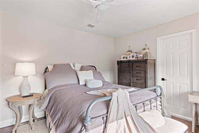 62 Hamlet Dr, Commack, NY 11725 - bedroom featuring baseboards and wood finished floors