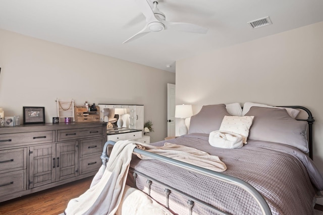 62 Hamlet Dr, Commack, NY 11725 - bedroom featuring dark wood-style flooring and ceiling fan