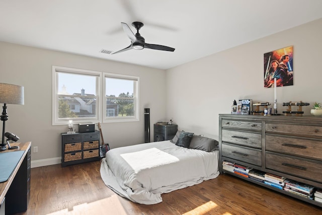 62 Hamlet Dr, Commack, NY 11725 - bedroom featuring dark wood-style flooring and a ceiling fan