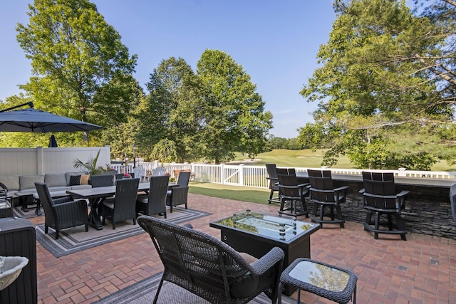 62 Hamlet Dr, Commack, NY 11725 - fenced backyard featuring outdoor dining space, a patio area, and a fire pit