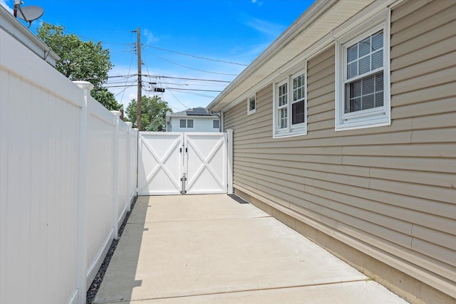 115 W Granada Ave, Lindenhurst, NY 11757 - view of patio / terrace featuring a gate