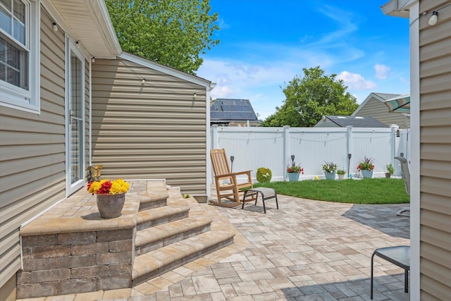 115 W Granada Ave, Lindenhurst, NY 11757 - fenced backyard featuring a patio area