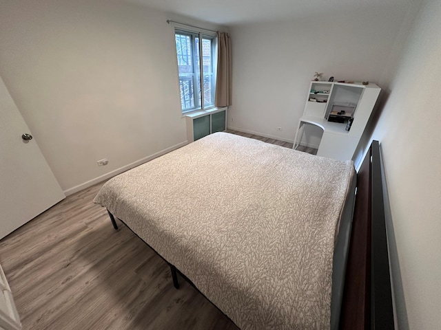 209-15 18th Ave Unit 2A, Bayside, NY 11360 - bedroom featuring wood finished floors and baseboards