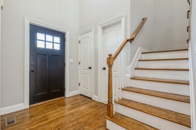 413 Robyn Pl, East Meadow, NY 11554 - entryway with wood finished floors and stairway