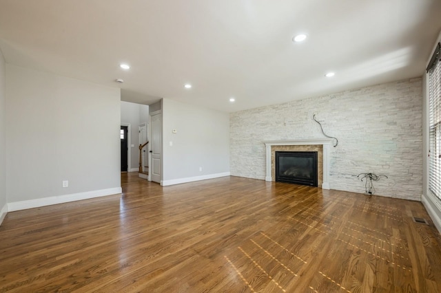 413 Robyn Pl, East Meadow, NY 11554 - unfurnished living room with a fireplace, wood finished floors, and recessed lighting