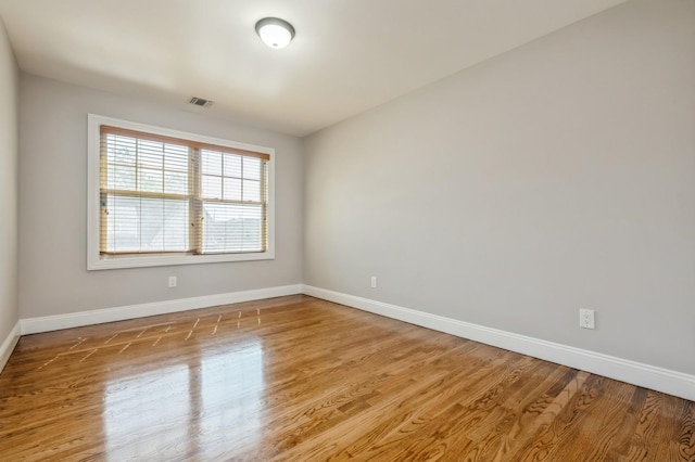 413 Robyn Pl, East Meadow, NY 11554 - empty room featuring baseboards and light wood finished floors