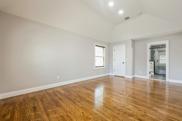 413 Robyn Pl, East Meadow, NY 11554 - empty room with lofted ceiling, wood finished floors, and recessed lighting