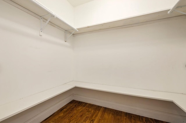 413 Robyn Pl, East Meadow, NY 11554 - spacious closet featuring dark wood-style flooring