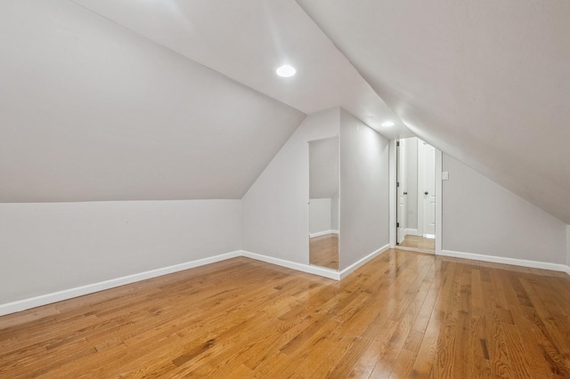 413 Robyn Pl, East Meadow, NY 11554 - bonus room featuring light wood finished floors, vaulted ceiling, and recessed lighting