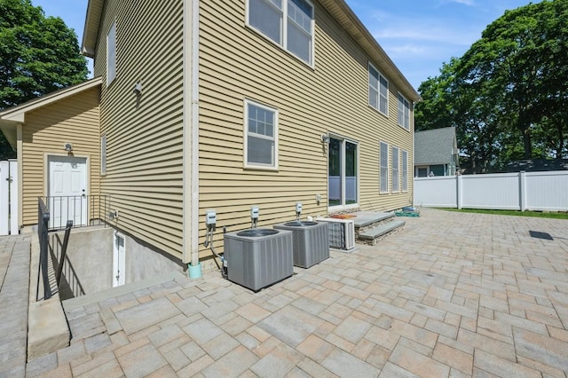 413 Robyn Pl, East Meadow, NY 11554 - back of property featuring a patio