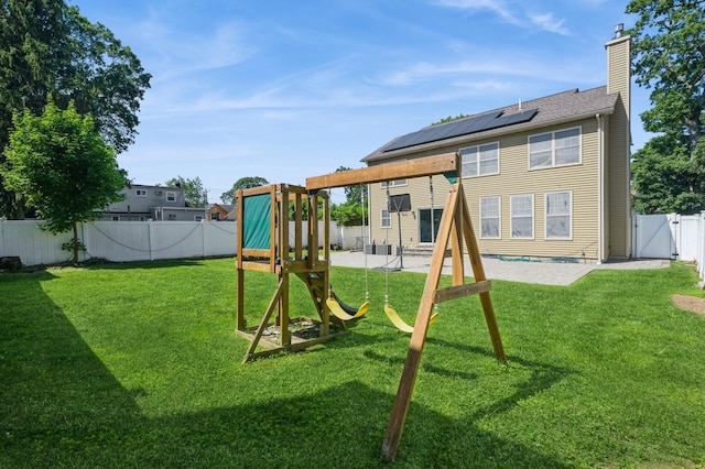 413 Robyn Pl, East Meadow, NY 11554 - view of playground featuring a fenced backyard, a gate, and a patio