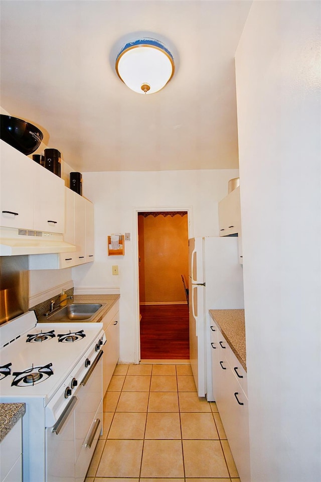770 Bronx River Rd Unit A53, Bronxville, NY 10708 - kitchen featuring under cabinet range hood, white appliances, white cabinets, and light tile patterned floors