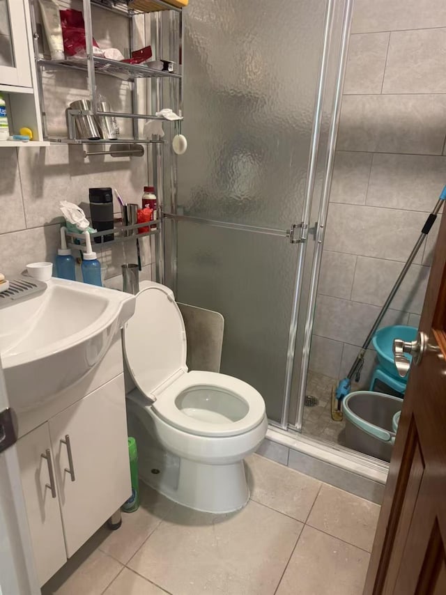 58-13 150th St, Flushing, NY 11355 - full bath featuring vanity, a stall shower, and tile patterned floors