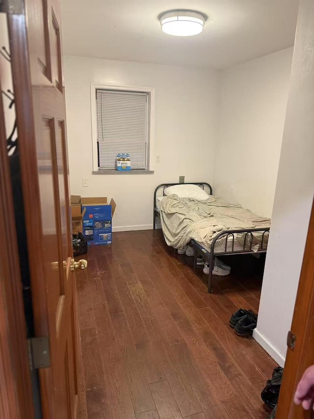 58-13 150th St, Flushing, NY 11355 - bedroom featuring dark wood-style flooring