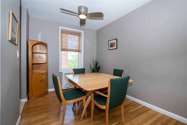 625 Gramatan Ave Unit 6L, Fleetwood, NY 10552 - dining space featuring radiator, light wood-style floors, and a ceiling fan