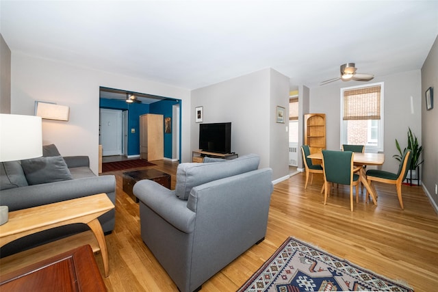 625 Gramatan Ave Unit 6L, Fleetwood, NY 10552 - living room with a ceiling fan, light wood-style flooring, and radiator heating unit