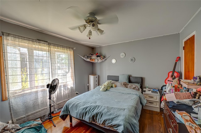 805 Arlington Rd, West Babylon, NY 11704 - bedroom featuring wood finished floors, crown molding, and a ceiling fan