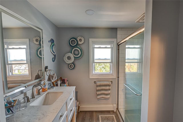 805 Arlington Rd, West Babylon, NY 11704 - full bath featuring wood finished floors, vanity, and a stall shower