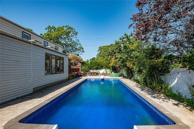 805 Arlington Rd, West Babylon, NY 11704 - view of swimming pool featuring a fenced backyard and a patio