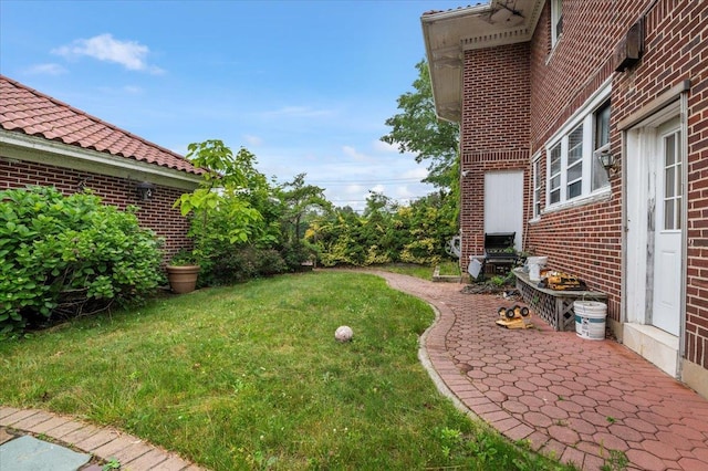 345 Broadway, Lawrence, NY 11559 - view of green lawn featuring a patio area