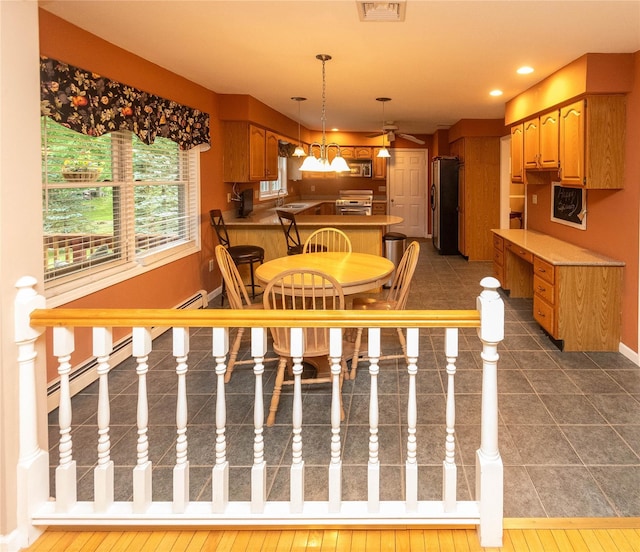 25 Briarwood Dr, Wappingers Falls, NY 12590 - dining space with a ceiling fan, baseboard heating, and recessed lighting