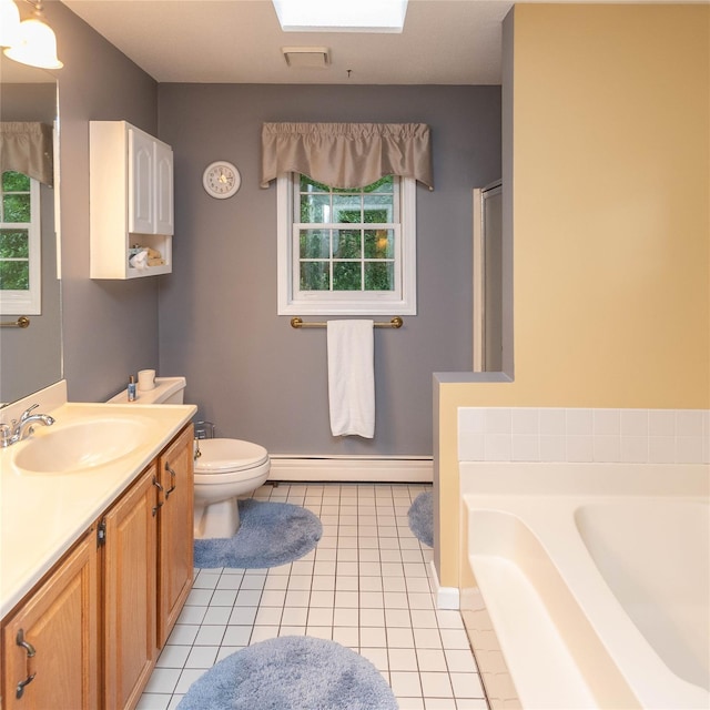25 Briarwood Dr, Wappingers Falls, NY 12590 - full bath with healthy amount of natural light, vanity, a baseboard heating unit, and tile patterned floors