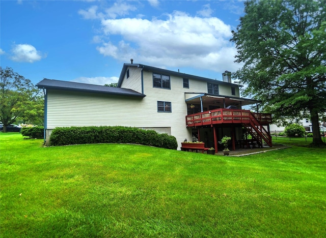 25 Briarwood Dr, Wappingers Falls, NY 12590 - rear view of house featuring a wooden deck, stairs, a lawn, and a chimney