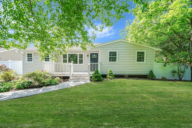 14 Sycamore St, Centereach, NY 11720 - ranch-style home featuring a wooden deck
