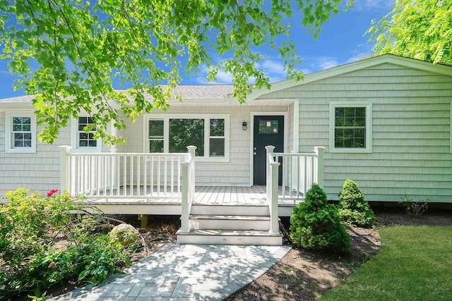 14 Sycamore St, Centereach, NY 11720 - ranch-style house featuring a deck
