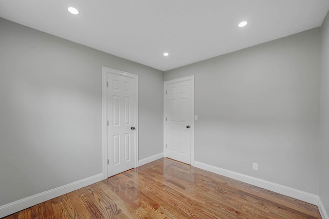 14 Sycamore St, Centereach, NY 11720 - spare room with light wood-type flooring and recessed lighting