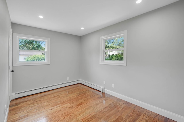 14 Sycamore St, Centereach, NY 11720 - empty room featuring wood finished floors and recessed lighting