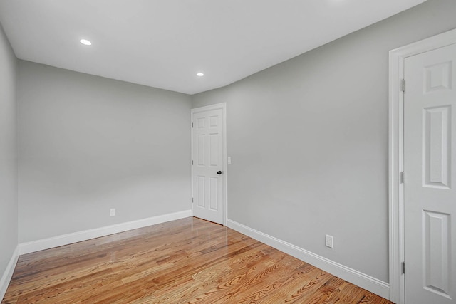 14 Sycamore St, Centereach, NY 11720 - empty room featuring light wood-type flooring and recessed lighting