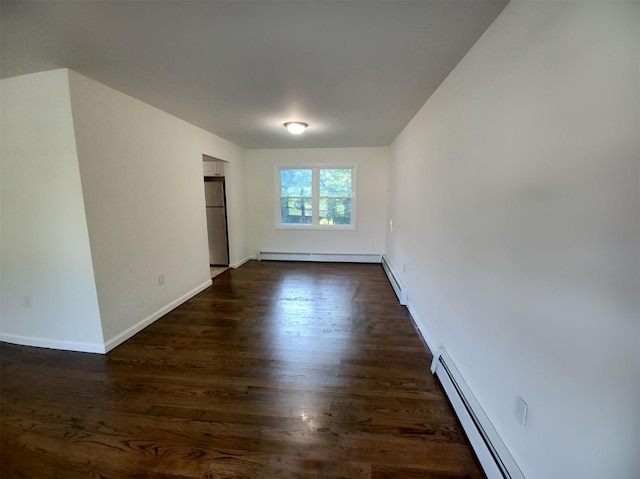14 Laddie Rd, Middletown, NY 10941 - empty room with a baseboard heating unit and dark wood-style floors