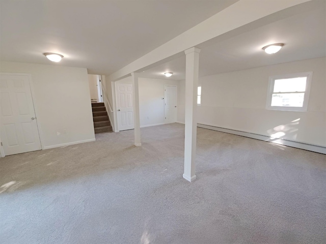 14 Laddie Rd, Middletown, NY 10941 - below grade area featuring carpet, stairway, and a baseboard heating unit